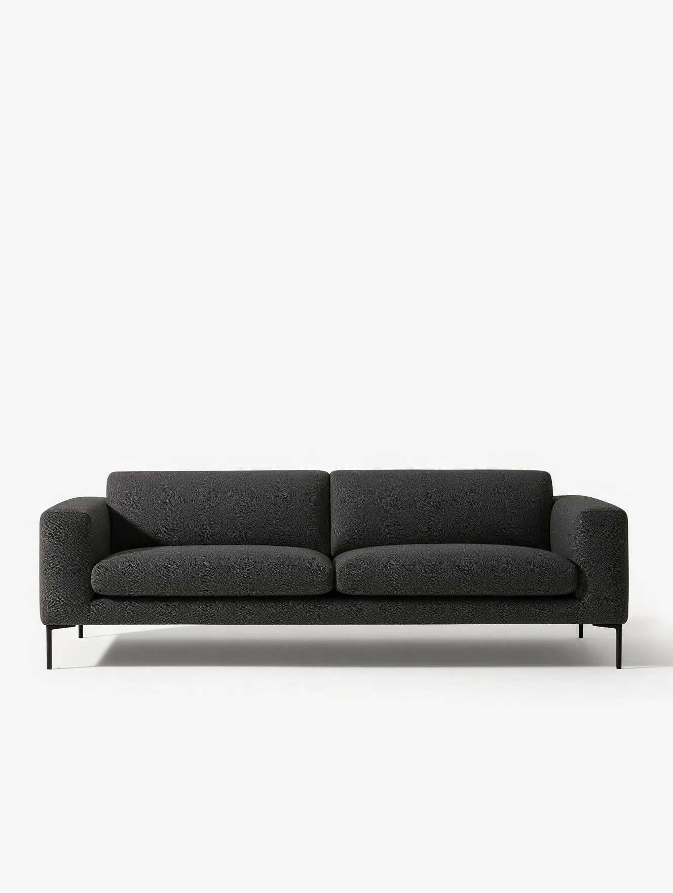 Marchetti two-seater sofa in charcoal fabric with square arms and slim black legs, on a white background.